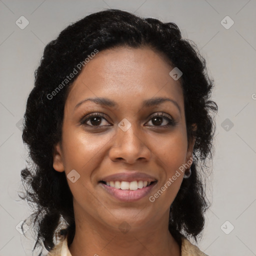 Joyful black young-adult female with long  brown hair and brown eyes