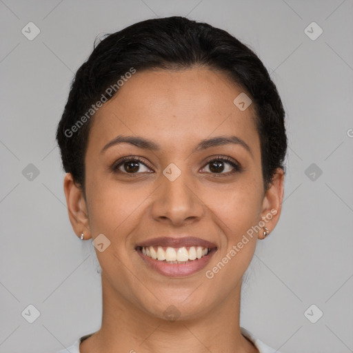 Joyful latino young-adult female with short  brown hair and brown eyes