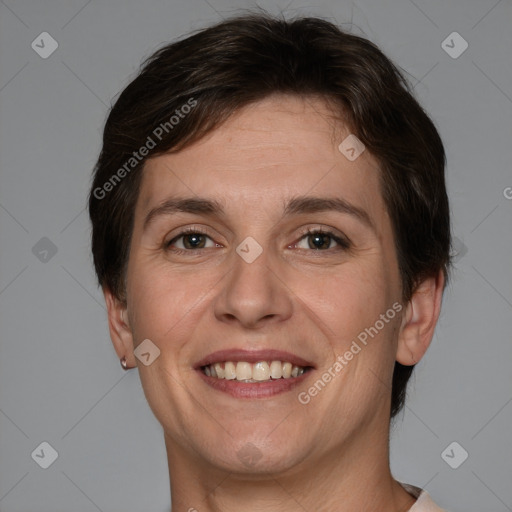 Joyful white adult female with short  brown hair and brown eyes