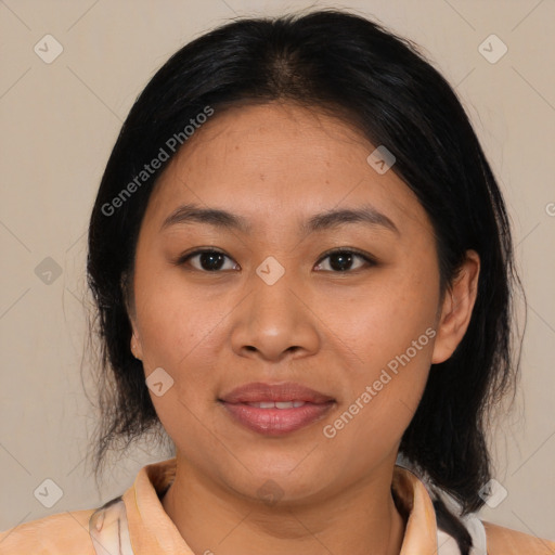 Joyful latino young-adult female with medium  brown hair and brown eyes