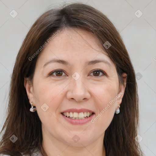 Joyful white adult female with medium  brown hair and brown eyes