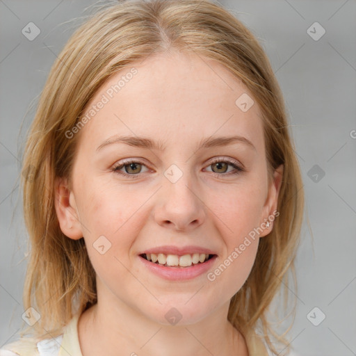 Joyful white young-adult female with medium  brown hair and blue eyes