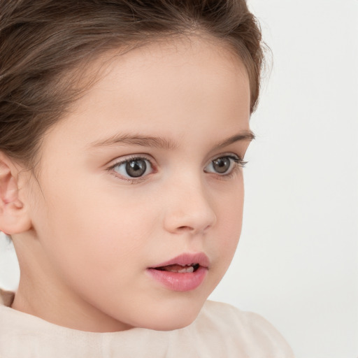 Neutral white child female with short  brown hair and brown eyes