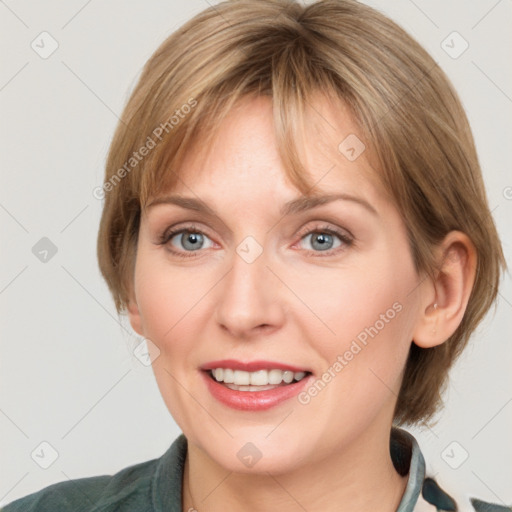 Joyful white young-adult female with medium  brown hair and blue eyes