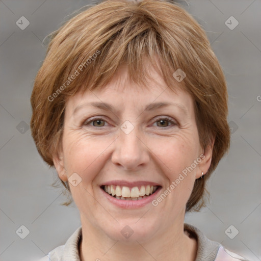 Joyful white adult female with medium  brown hair and grey eyes