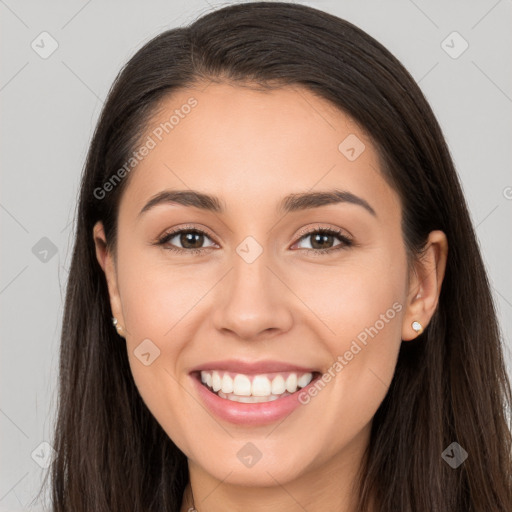 Joyful white young-adult female with long  brown hair and brown eyes