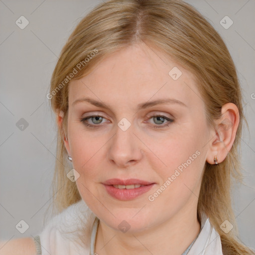 Joyful white young-adult female with medium  brown hair and blue eyes