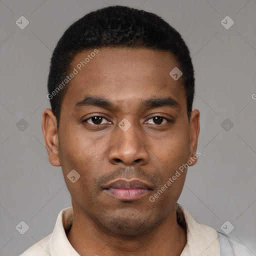 Neutral latino young-adult male with short  black hair and brown eyes
