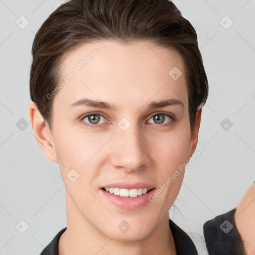 Joyful white young-adult female with short  brown hair and brown eyes