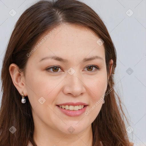 Joyful white young-adult female with long  brown hair and brown eyes