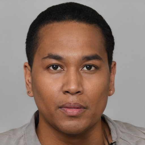 Neutral black young-adult male with short  black hair and brown eyes
