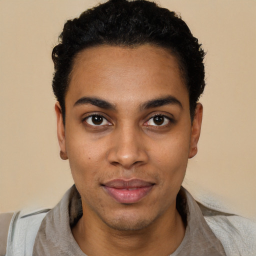 Joyful latino young-adult female with short  black hair and brown eyes