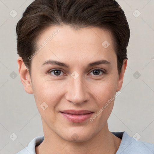 Joyful white young-adult female with short  brown hair and brown eyes