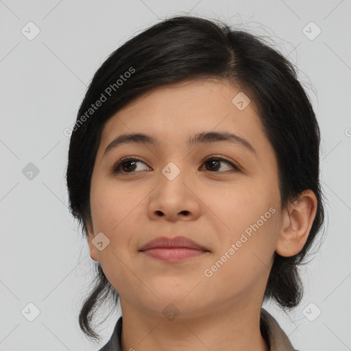 Joyful asian young-adult female with medium  black hair and brown eyes