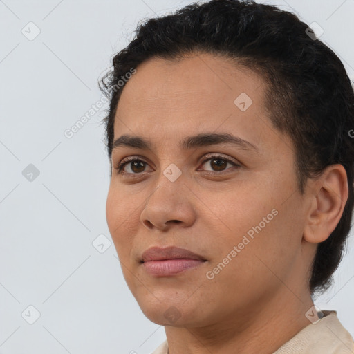 Joyful white young-adult female with short  brown hair and brown eyes