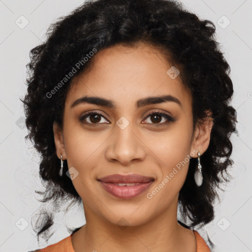 Joyful latino young-adult female with long  black hair and brown eyes