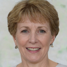 Joyful white adult female with short  brown hair and grey eyes