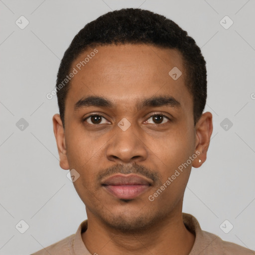 Neutral black young-adult male with short  black hair and brown eyes