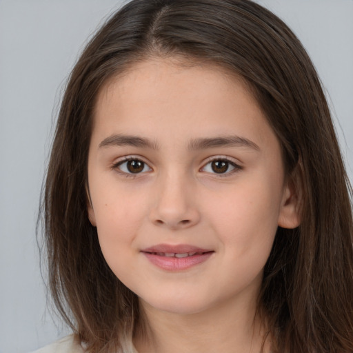 Joyful white child female with medium  brown hair and brown eyes