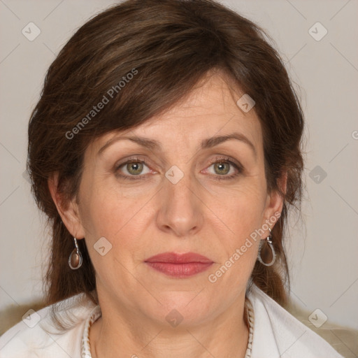 Joyful white adult female with medium  brown hair and grey eyes