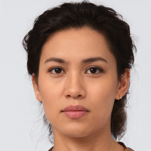 Neutral asian young-adult female with medium  brown hair and brown eyes