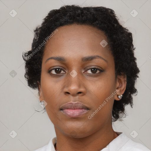 Neutral black young-adult female with short  brown hair and brown eyes