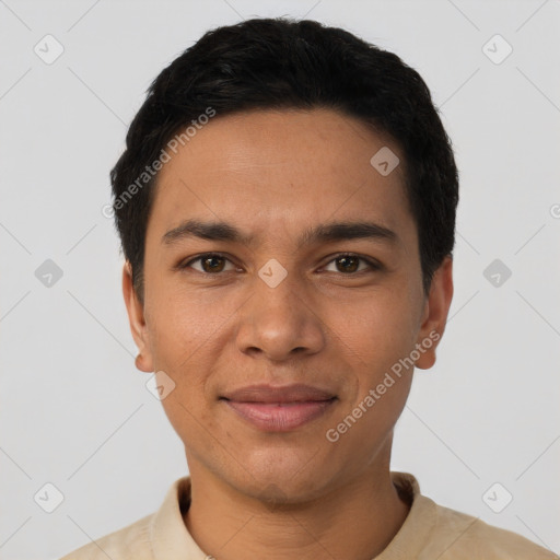 Joyful latino young-adult male with short  black hair and brown eyes