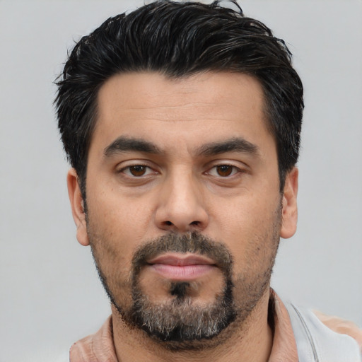 Neutral white young-adult male with short  black hair and brown eyes