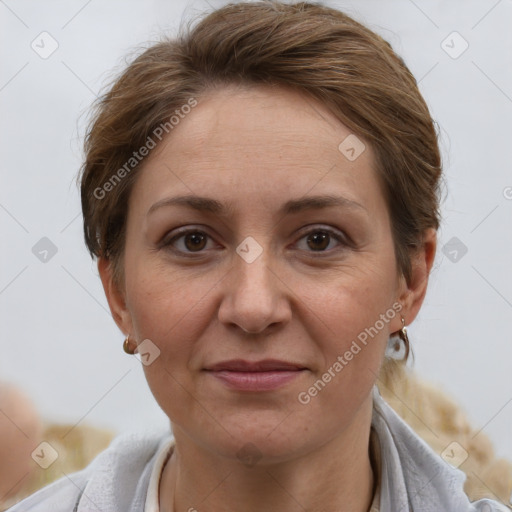 Joyful white adult female with short  brown hair and brown eyes