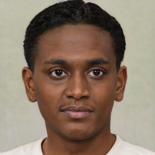 Neutral black young-adult male with short  black hair and brown eyes