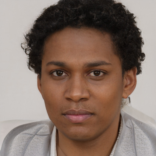 Neutral black young-adult male with short  brown hair and brown eyes