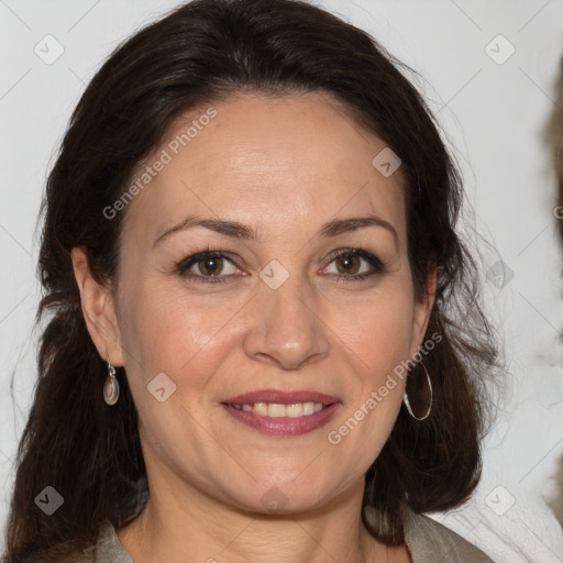 Joyful white adult female with medium  brown hair and brown eyes