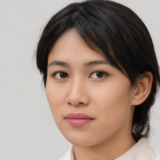 Neutral asian young-adult female with medium  brown hair and brown eyes