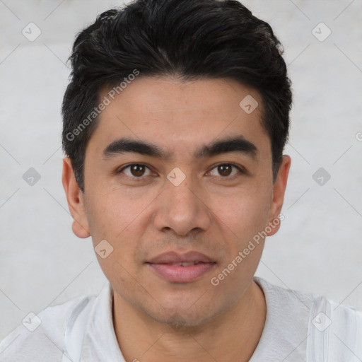 Joyful white young-adult male with short  black hair and brown eyes