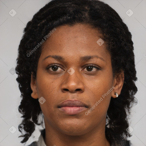 Neutral black young-adult female with short  black hair and brown eyes