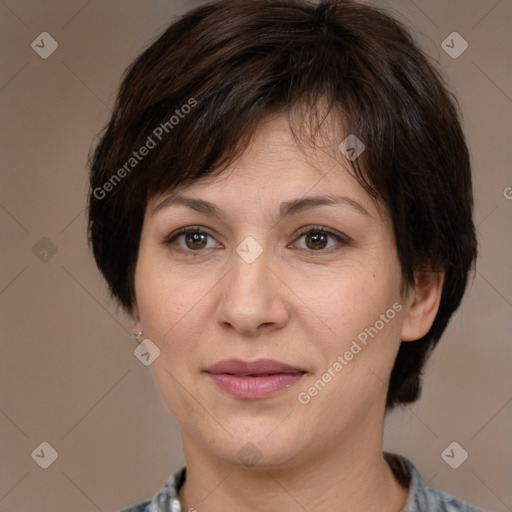 Joyful white adult female with medium  brown hair and brown eyes