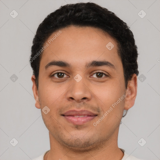 Neutral latino young-adult male with short  black hair and brown eyes