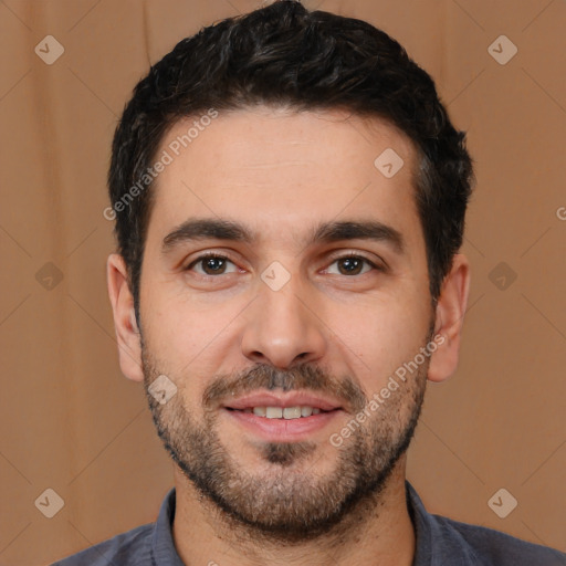 Joyful white young-adult male with short  black hair and brown eyes