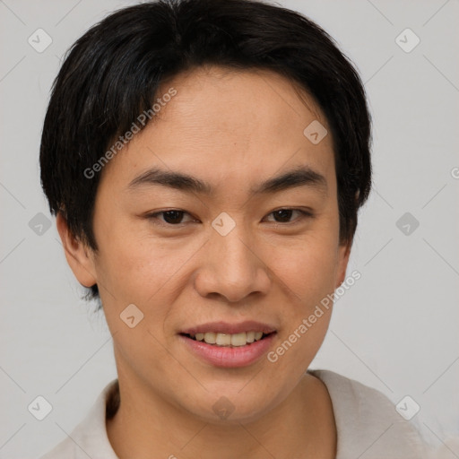 Joyful asian young-adult female with short  brown hair and brown eyes