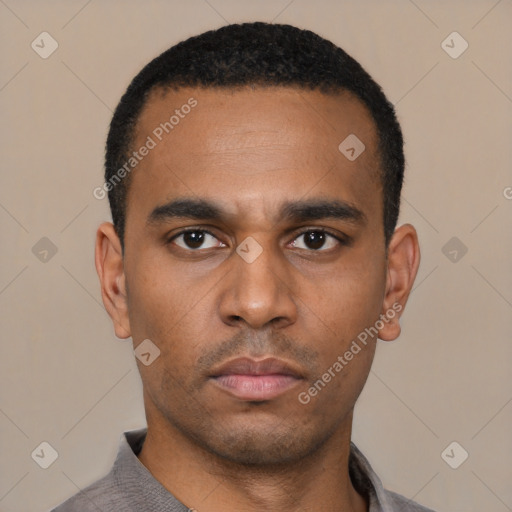 Neutral latino young-adult male with short  black hair and brown eyes