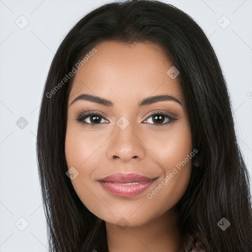 Joyful latino young-adult female with long  brown hair and brown eyes