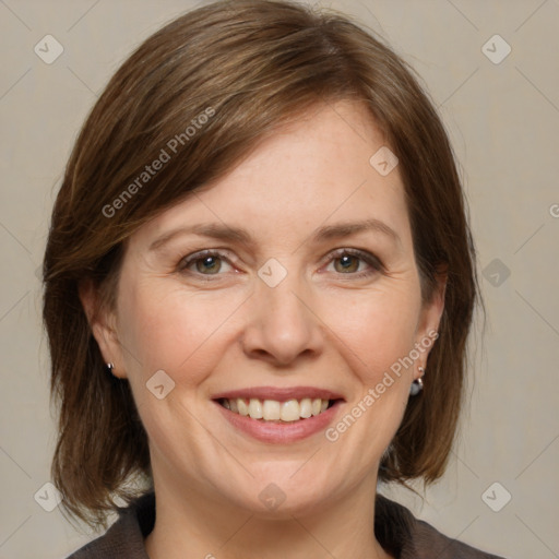 Joyful white adult female with medium  brown hair and brown eyes