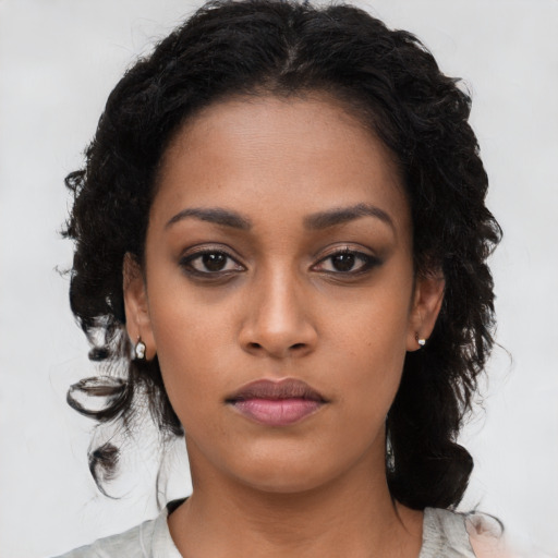 Neutral black young-adult female with medium  black hair and brown eyes