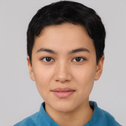 Joyful asian young-adult female with short  black hair and brown eyes