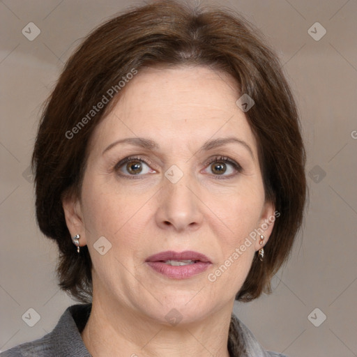 Joyful white adult female with medium  brown hair and grey eyes