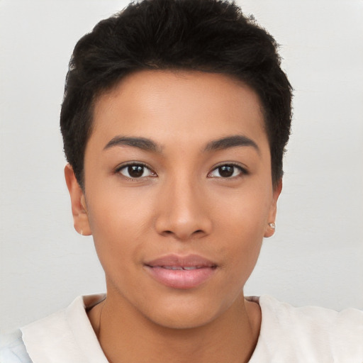 Joyful latino young-adult female with short  black hair and brown eyes