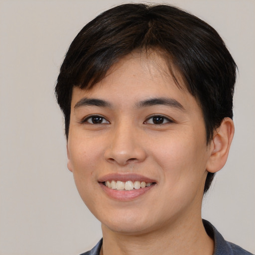 Joyful white young-adult female with medium  black hair and brown eyes