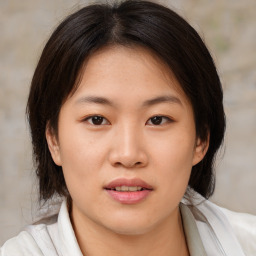 Neutral asian young-adult female with medium  brown hair and brown eyes