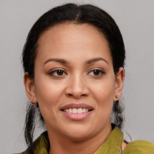 Joyful white young-adult female with medium  brown hair and brown eyes