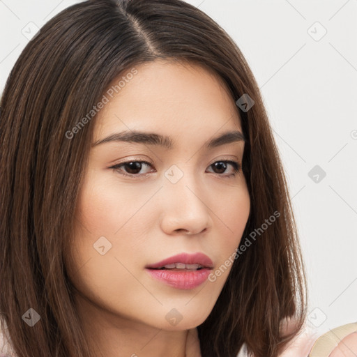 Neutral white young-adult female with long  brown hair and brown eyes